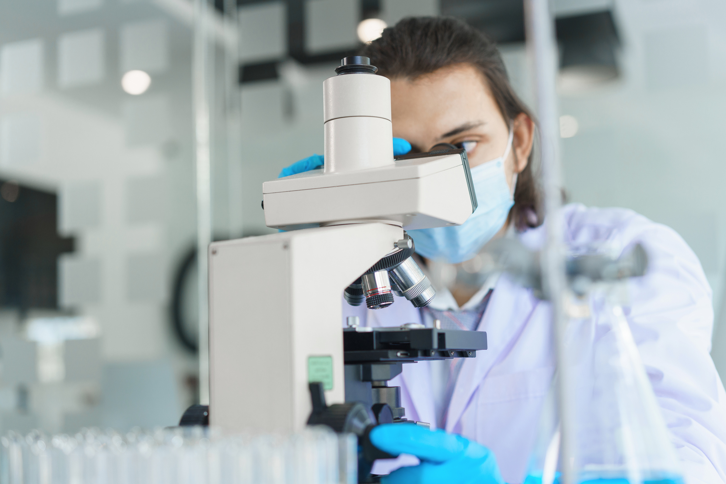 Laboratory research concept, Scientist using microscope to r
